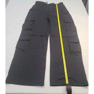 black nylon blend cargo pants Size M with an elastic waist and multiple pockets.